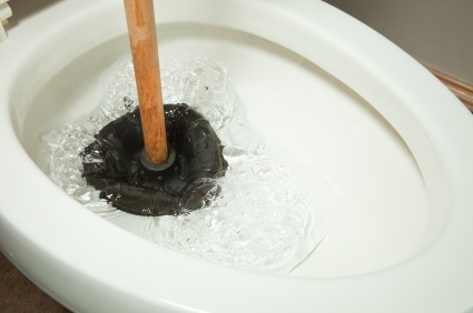Toilet repair by Overland Plumbing